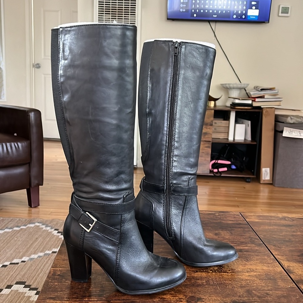 Black leather knee high boots
